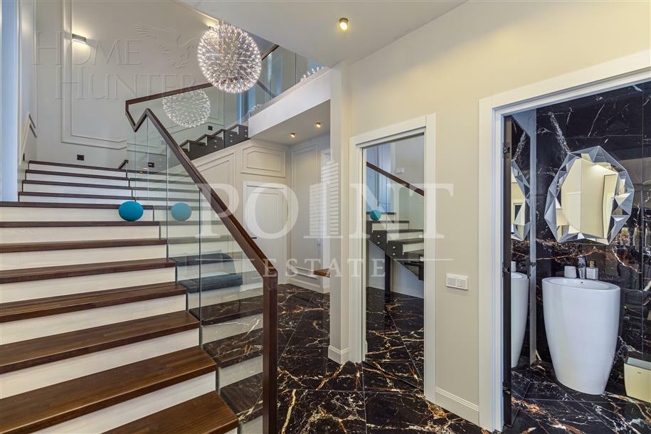 3-этажный коттедж 400 м² с отделкой