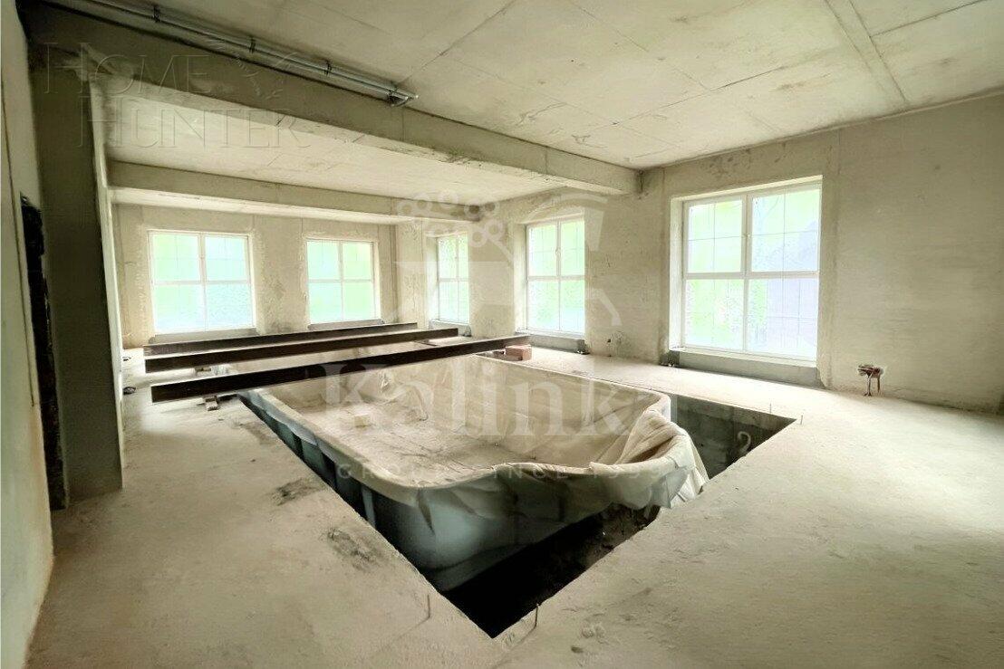 3-этажный коттедж 900 м² без отделки