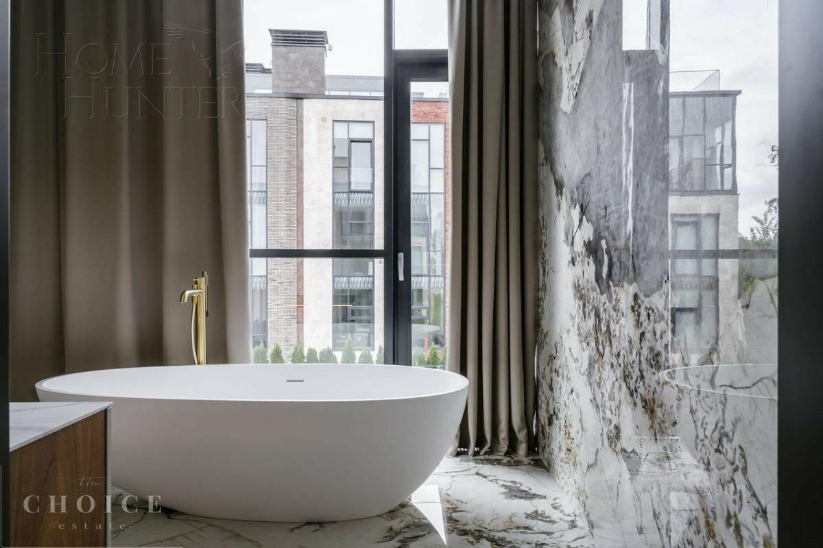 3-этажный таунхаус 310 м² с отделкой