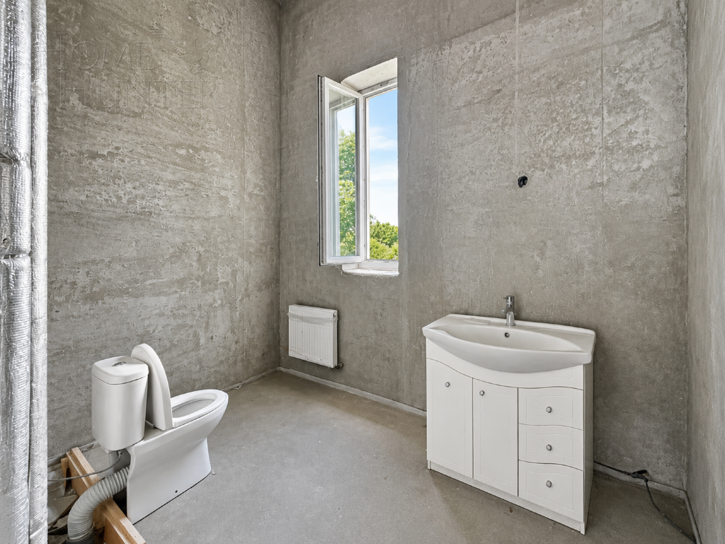 3-этажный коттедж 560 м² без отделки