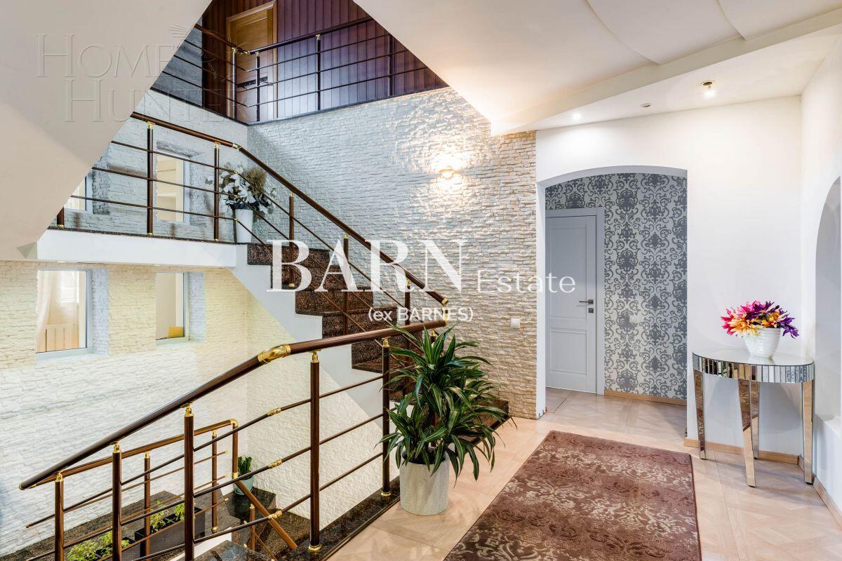 3-этажный коттедж 400 м² с отделкой